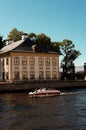 Motor boat is sailing down the canal in Saint-Petersburg Royalty Free Stock Photo