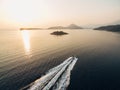 Motor boat sails to the Mamula fortress on the island. Kotor Bay