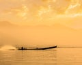 Motor boat silhouette on Inle lake