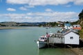 Motor boats and boat sheds Royalty Free Stock Photo