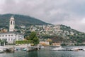 Motor boats are moored at the pier in the town of Cernobbio. Lake Como, Italy Royalty Free Stock Photo