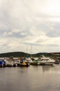 Motor boats on pier on Ladoga lake Royalty Free Stock Photo