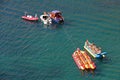 Motor boats are preparing to roll people on an banana boat Royalty Free Stock Photo