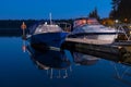 Motor boats rest at night