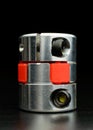 Motor coupling to reduce vibration and smooth start and running of mechanism.