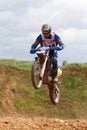 Motor-cyclist jumps at first stage of race