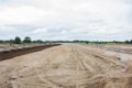 The Motor grader working on road construction.