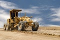 Motor grader working on road construction