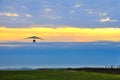 Motor hang glider in the cloudy sunset Royalty Free Stock Photo