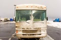 A motor-home crusted with ice in wyoming in the springtime