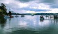 Motor launch motoring out of Whangaroa Harbour marina, Far North Royalty Free Stock Photo