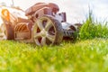 Motor mower to mow the green lawn. the sun shines on the grass Royalty Free Stock Photo
