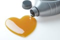 Motor oil canister with a drop of motor oil in the form of heart