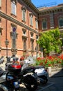 Motor scooters in street Brera Milan Italy