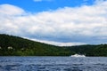 motor ship floats with passengers on the reservoir. Summer boat trip on the water Royalty Free Stock Photo