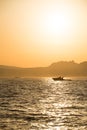 Motor speed boat at sunset Royalty Free Stock Photo