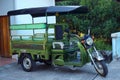 Motor taxi tuk-tuk on the street , motorcyclists , Local vehicle for take passenger