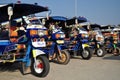 Motor tricycle queue in Lao Royalty Free Stock Photo