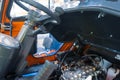 Motor under raised electric forklift seat