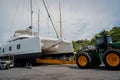 Motor yacht moored for repairs and service in dry dock