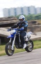 The motoracer on blurred background