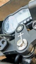 Motorbike with crucifix symbol near ignition key slot,Mysuru,Karnataka,India Royalty Free Stock Photo