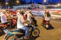 Motorbike drivers at the crossroad, Ho Chi Minh City Royalty Free Stock Photo