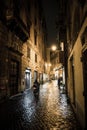 Motorbike in Narrow Street at Night in Rome in Italy