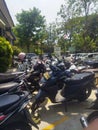 the motorbike parking area is orderly, clean and dense, the motorbikes are automatic