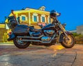 Motorbike is parking on the street of the night city Royalty Free Stock Photo