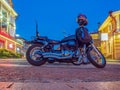 Motorbike is parking on the street of the night city Royalty Free Stock Photo