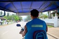 Motorbike taxi riding send passenger go to Luangphrabang airport