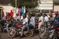 Motorbike taxis at the traffic lights. Kampala, Uganda. Royalty Free Stock Photo