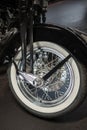 Motorbike wheel closeup. Harley Davidson. Disc brakes front wheel of Harley Davidson\'s shiny reflective