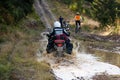 Motorbiker in autumn forest