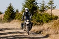 Motorbiker travelling in autumn mountains Royalty Free Stock Photo