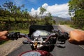 Motorbiker travelling in mountains,