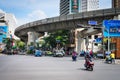 Motorbikes and cars on Bangkok street