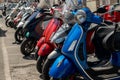 Motorbikes line up in Rome street