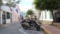 Motorbikes parked on a street in Key West