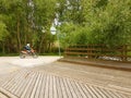 Motorbikie racing speeding through the trees in rural raod