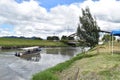 Motorboat is directed to collect visitors to take a tour of the BogotÃÂ¡ River at eighty street in the capital of Colombia, as a pr