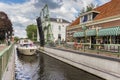 Motorboat going under the bridge in Blokzijl Royalty Free Stock Photo