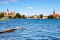 Motorboat on Lake Schwerin with castle, cathedral and old town in the background. Mecklenburg-Vorpommern, Germany