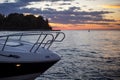 motorboat parked next do island at sunset Royalty Free Stock Photo