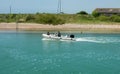 Motorboat on River Arun, Littlehampton, England Royalty Free Stock Photo