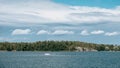 A motorboat sailing the sea on the Ãland Islands on a summer day Royalty Free Stock Photo