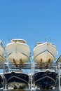 Motorboats racked one above another in a dry rack boat storage facility Royalty Free Stock Photo