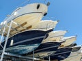 Motorboats racked one above another in a dry rack boat storage facility Royalty Free Stock Photo