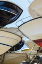 Motorboats racked one above another in a dry rack boat storage facility Royalty Free Stock Photo
